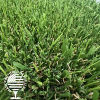 Close-up of artificial grass turf, featuring natural color variation and durable fibers for residential lawns, commercial landscapes, and sports applications by Southwest Greens.