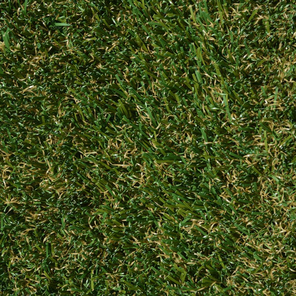 A close up image of artificial grass with green and brown A close up image of artificial grass with green and brown