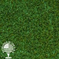 A close up image of artificial green grass.